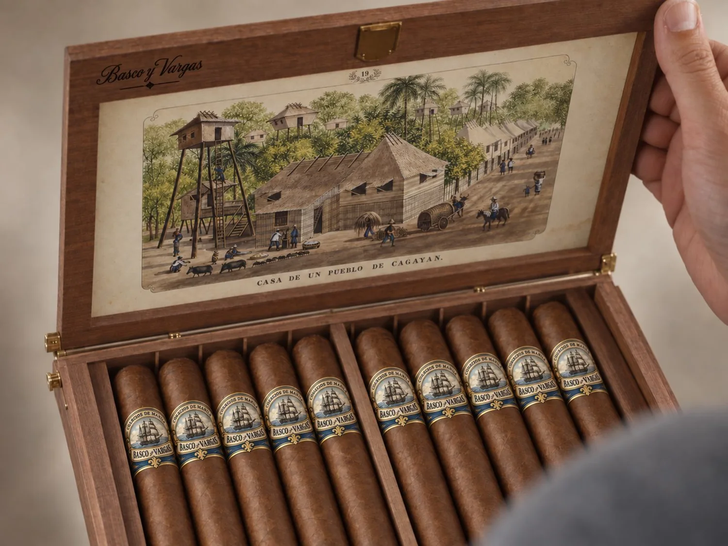 An open Basco y Vargas box of ten cigars, the Cagayan lithograph of 1847 inside the lid